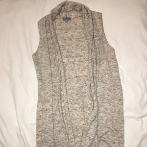 Sleeveless knit cardigan.